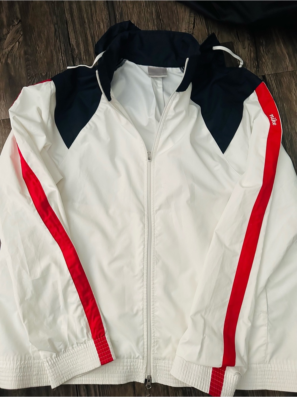 Nike White Windbreaker Jacket with Red Sleeve Stripes and Navy Accents